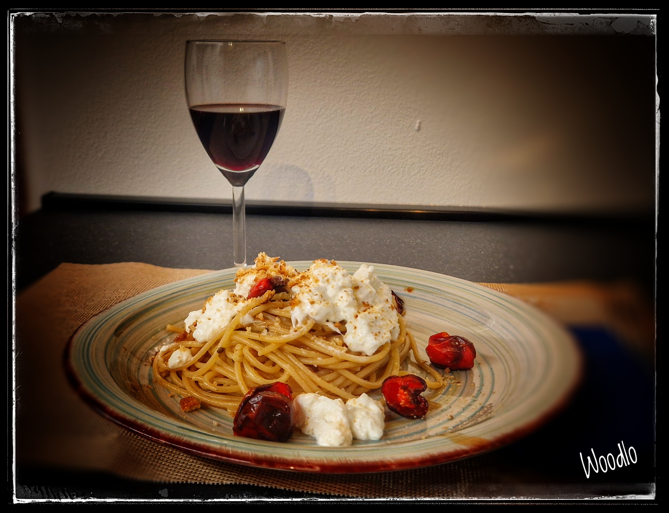 SPAGHETTI ACCIUGA, BURRATA E POMODORINI CONFIT